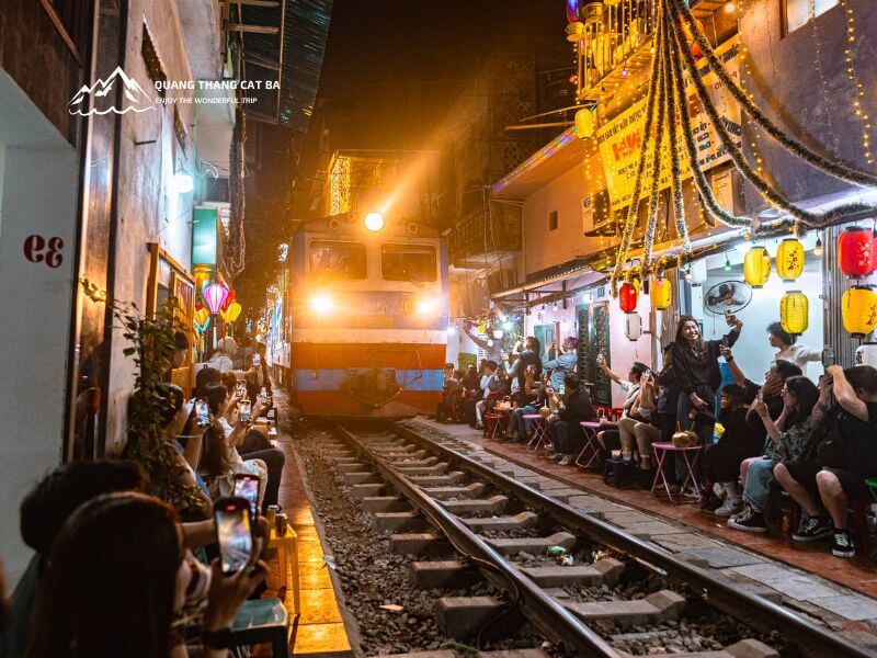 train street hanoi at night